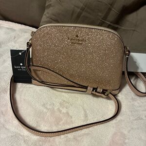Kate spade dome rose gold purse